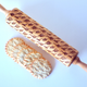 Illustration for article titled This Baker Made a Laser-Engraved Rolling Pin. Now She Has Dino-Cookies!
